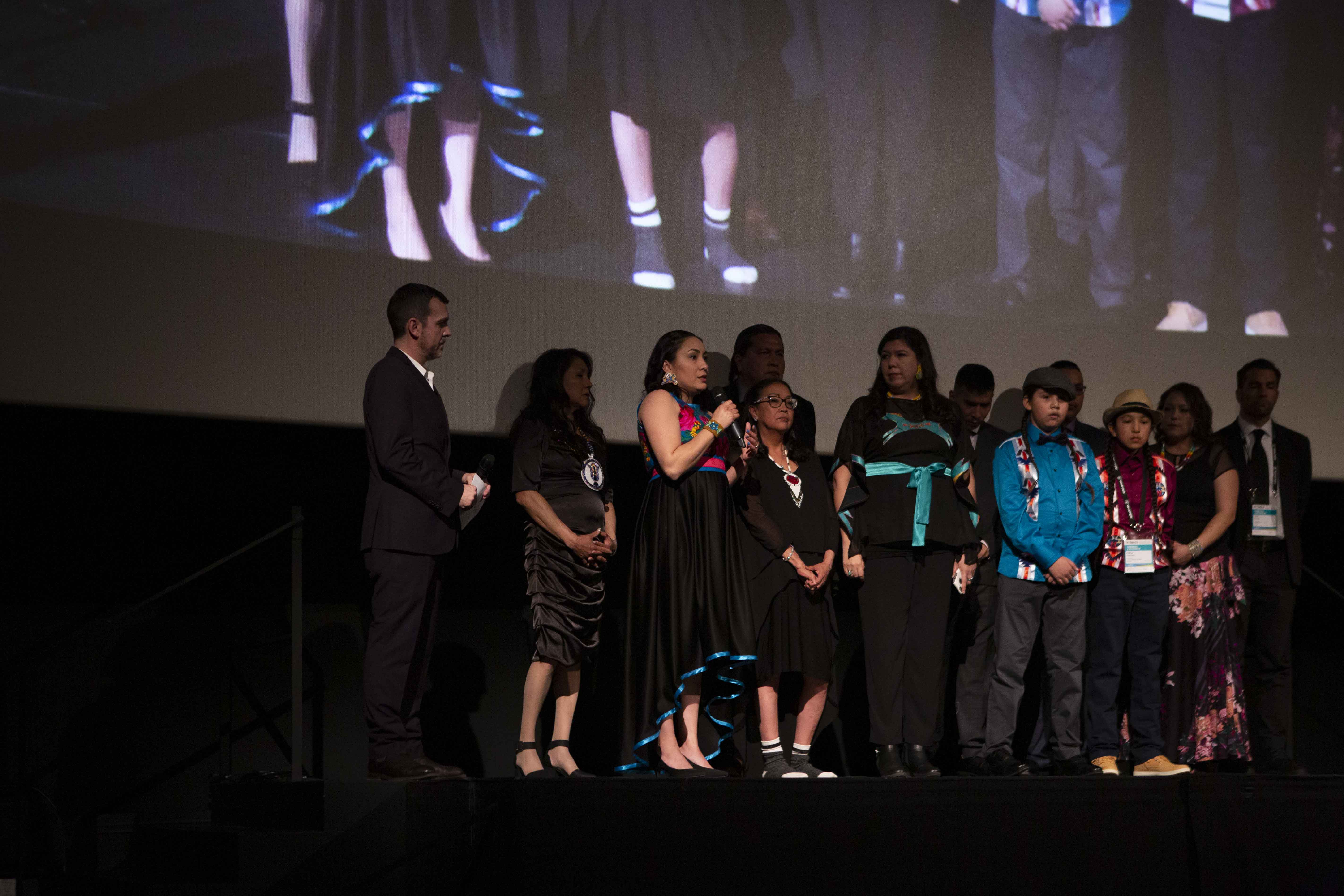 Colten Boushie's cousin, Jade Tootoosis answers a question from the audience at the HotDocs premiere of Tasha Hubbard's documentary nipawistamasowin: We Will Stand Up. (Photo by David Spowart, courtesy of Hot Docs).